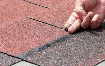 Rake Common asphalt roof repairs
